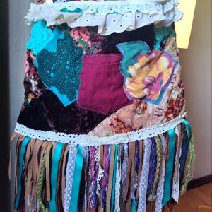 Upcycled collage fringe purse